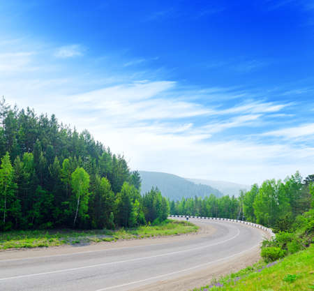 Mountain road and blue sky.の写真素材