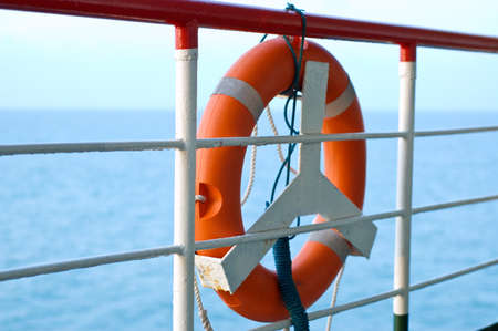red life buoy on boatの写真素材