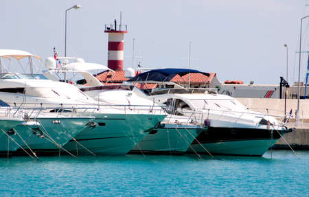 beautiful white yachts in portの写真素材