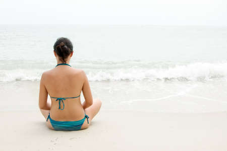 Young woman on the beach.の写真素材