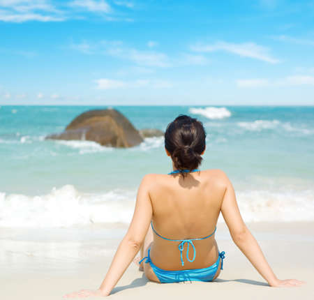 Young woman on the beach.の写真素材