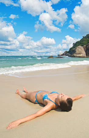 Young woman on the beach.の写真素材