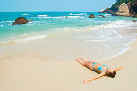Young woman on the beach.の写真素材