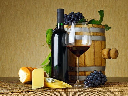 Wine and cheese on the tableの写真素材
