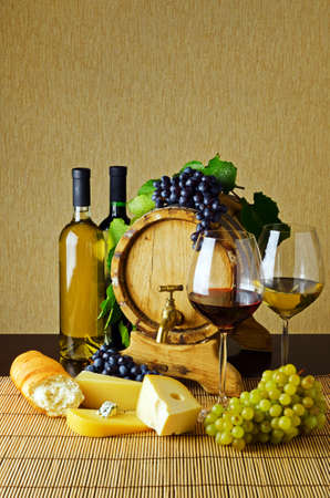 Wine and cheese on the tableの写真素材