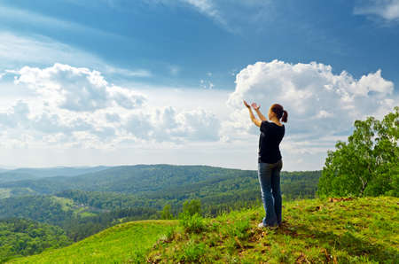 Young woman enjoying the fresh air.の写真素材