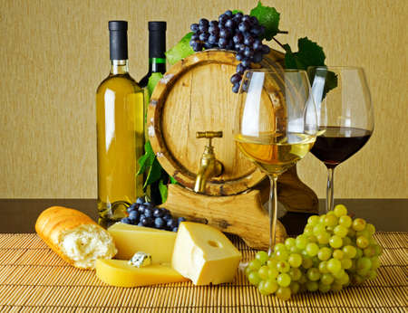 Wine and cheese on the tableの写真素材