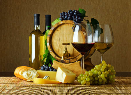 Wine and cheese on the tableの写真素材