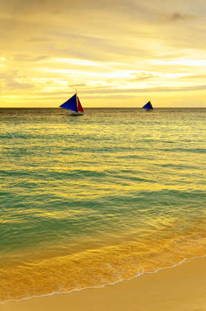 Sunset  landscape. Sailboat on coast of Boracay island.の写真素材