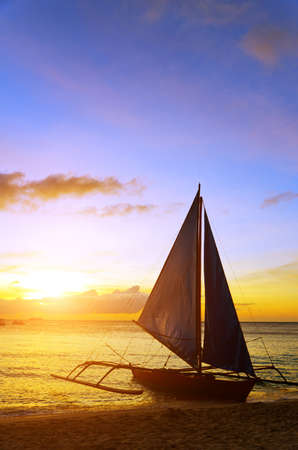 Sunset  landscape. Sailboat on coast of Boracay island.の写真素材
