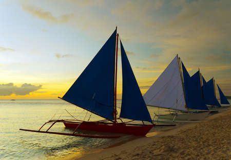 Sunset  landscape. Sailboat on coast of Boracay island.の写真素材