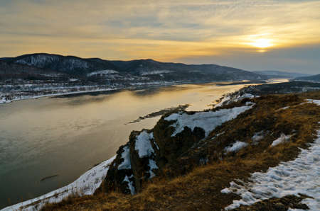 Winter landscape. Mountains and river.の写真素材