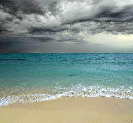 Tropical beach at cloudy weather. の写真素材
