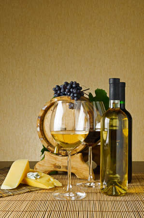 Wine and cheese on the tableの写真素材
