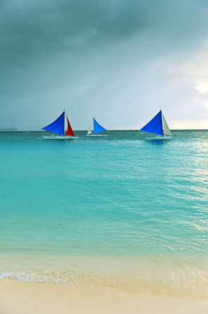 Sunset  landscape. Sailboat on coast of Boracay island.の写真素材