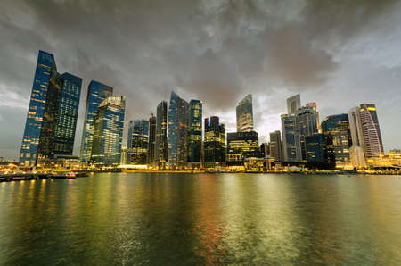 Singapore skyscrapers in downtown at evening time.の写真素材