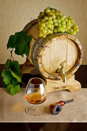 Glass of brandy on the table の写真素材
