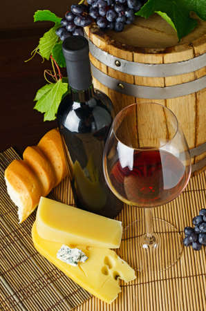 Wine and cheese on the tableの写真素材