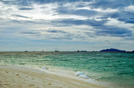 Tropical beach at cloudy weather. の写真素材