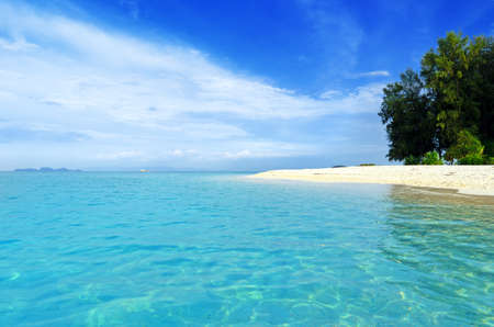 Tropical beach. Blue sky and clear water.の写真素材