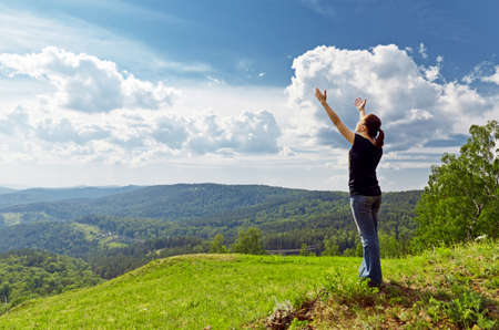 Young woman enjoying the fresh air.の写真素材
