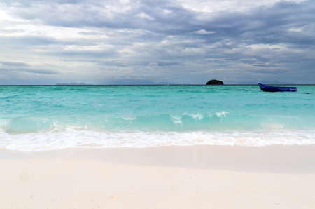 Tropical beach at cloudy weather. の写真素材