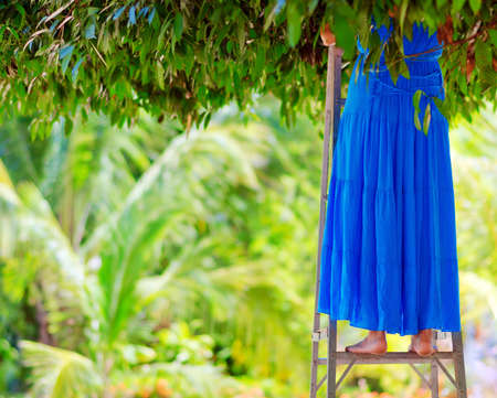 Young woman in the garden. の写真素材