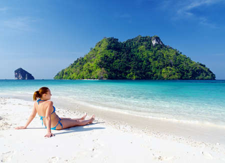 Young woman on the tropical beach.の写真素材