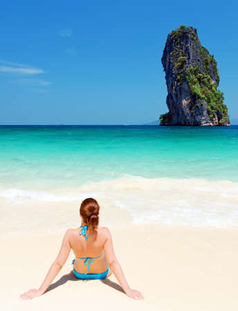 Young woman on the tropical beach.の写真素材