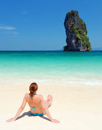 Young woman on the tropical beach.の写真素材