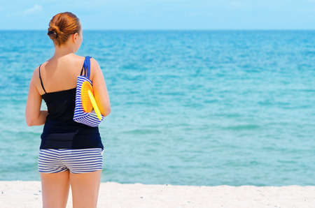 Young woman on the tropical beach.の写真素材