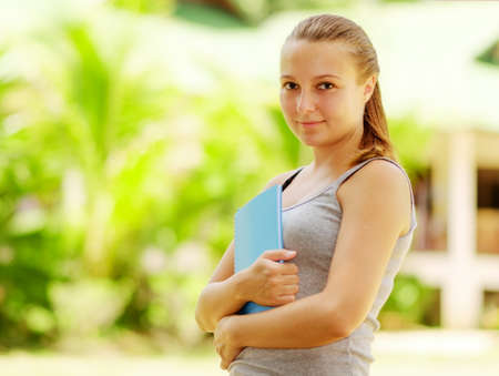 Young female student outdoor portrait.の写真素材