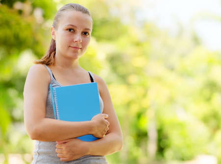 Young female student outdoor portrait.の写真素材