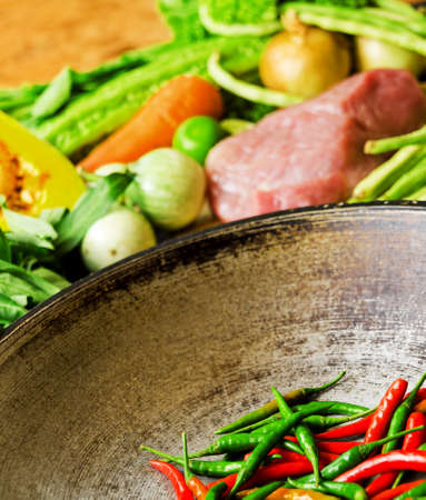 Preparation to asian traditional cooking. Wok and vegetables.の写真素材