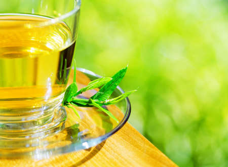 Cup of tea on nature background の写真素材