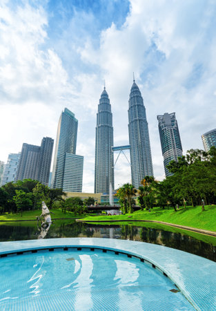 KUALA LUMPUR, MALAYSIA - NOVEMBER 1: View of Petronas Twin Towers on November 1, 2012 in Kuala Lumpur. The skyscrapers were tallest buildings in the world from 1998 to 2004. Currently the Petronas are the tallest twin towers in the world.のeditorial素材