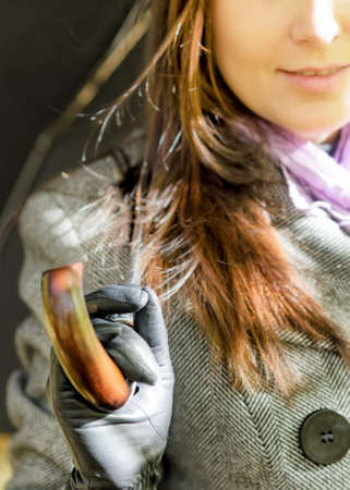 Woman's hand in the gloveの写真素材