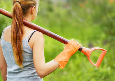 Woman working in the garden.の写真素材