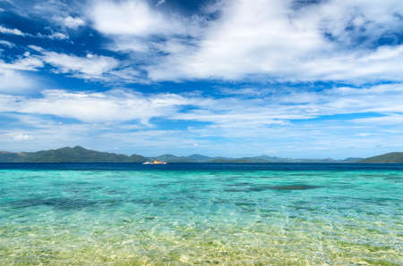 Beautiful tropical sea and blue sky の写真素材