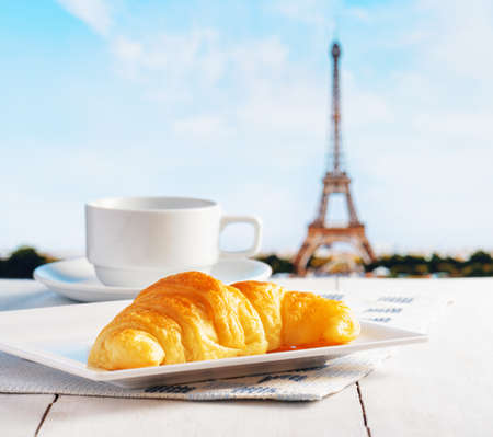 Cup of coffee and croissant in Paris. French cafe.の写真素材