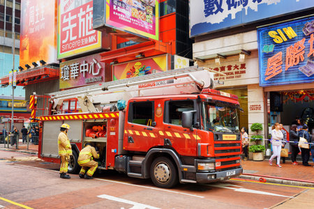 HONG KONG - FEBRUARY 1, 2015: Firefighters arrived on the challenge to the shopping mall of Hong Kong. Hong Kong is a popular tourist attraction of Asia and leading financial centre of the world.のeditorial素材