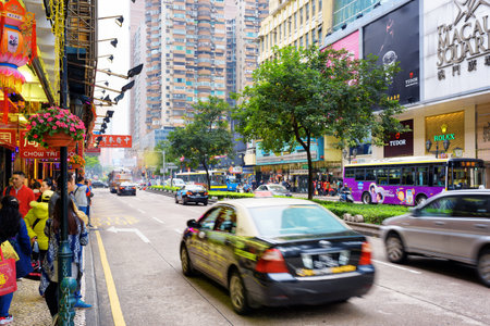 MACAU - JANUARY 30, 2015: Streets of Macau. Macau is a popular tourist attraction of Asia and leading casino market of the world.のeditorial素材
