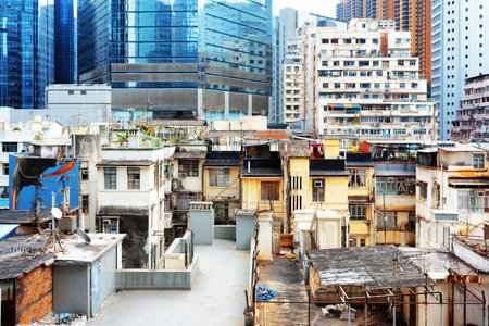 Old buildings coexist with modern skyscrapers in Hong Kong. Hong Kong is popular tourist destination of Asia and leading financial centre of the world.のeditorial素材