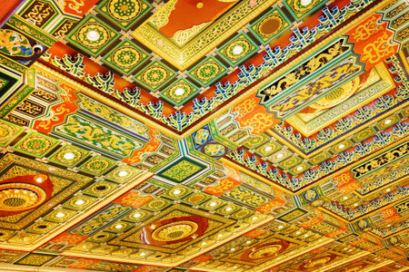 Gilded red patterns on the ceiling in interior of the temple, Po Lin Monastery at Lantau Island, in Hong Kong. Hong Kong is popular tourist destination of Asia.のeditorial素材