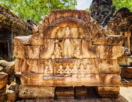 Bas-relief at ancient Ta Som temple in amazing Angkor, Siem Reap, Cambodia. Enigmatic Angkor is a popular tourist attraction.の写真素材