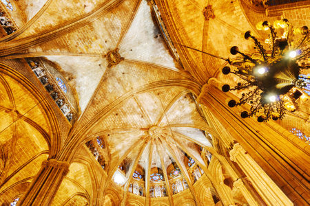 BARCELONA, SPAIN - AUGUST 21, 2014: View of gothic arches in interior of the Cathedral of Holy Cross and Saint Eulalia (Catedral de la Santa Cruz y Santa Eulalia), also known as Barcelona Cathedral.のeditorial素材