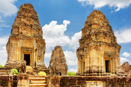 Enigmatic towers of ancient East Mebon temple in amazing Angkor, Siem Reap, Cambodia. Mysterious Angkor is a popular tourist attraction.のeditorial素材
