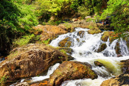 Beautiful cascade of the Datanla waterfall in Da Lat city (Dalat), Vietnam. Da Lat and the surrounding area is a popular tourist destination of Asia.の写真素材
