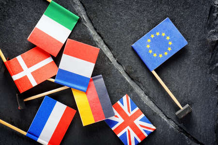 Political concept with flag of the European Union (EU). Flags of European countries separated by crack from flag of the European Union.の写真素材