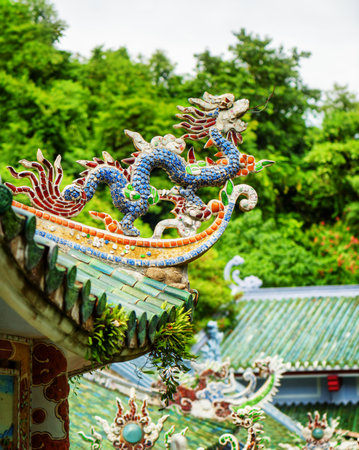 Traditional colorful mosaic dragon on roof of the Linh Ung Pagoda in the Marble Mountains (Ngu Hanh Son), Danang (Da Nang), Vietnam. The Marble Mountains is a popular tourist destination of Asia.のeditorial素材